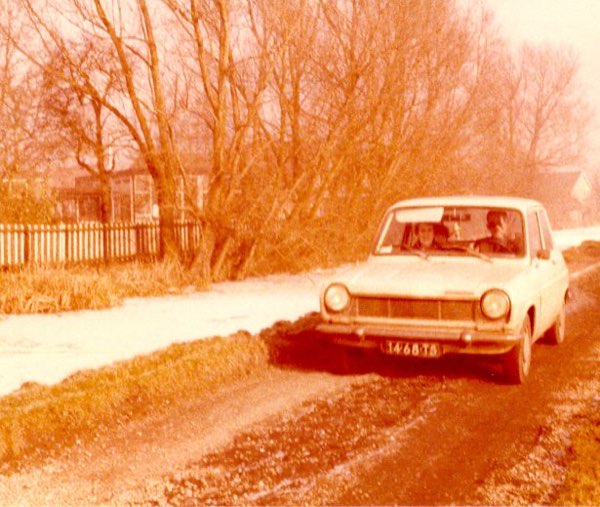 De familie in de Simca
