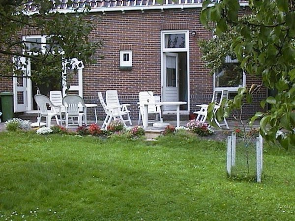 De achtertuin van het huis waarin ik ben opgegroeid.