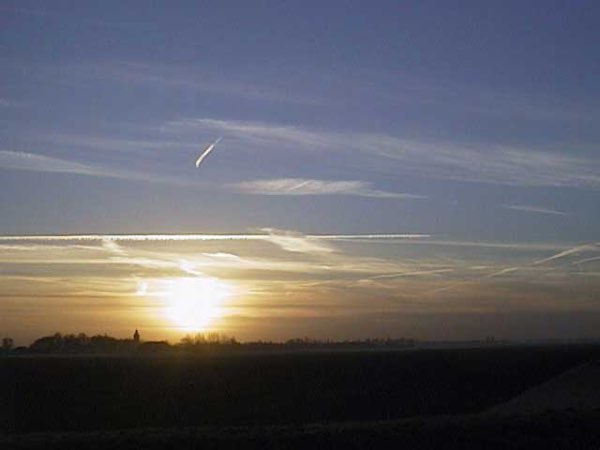 Een zonsopgang, gezien vanuit de achtertuin van mijn ouders.